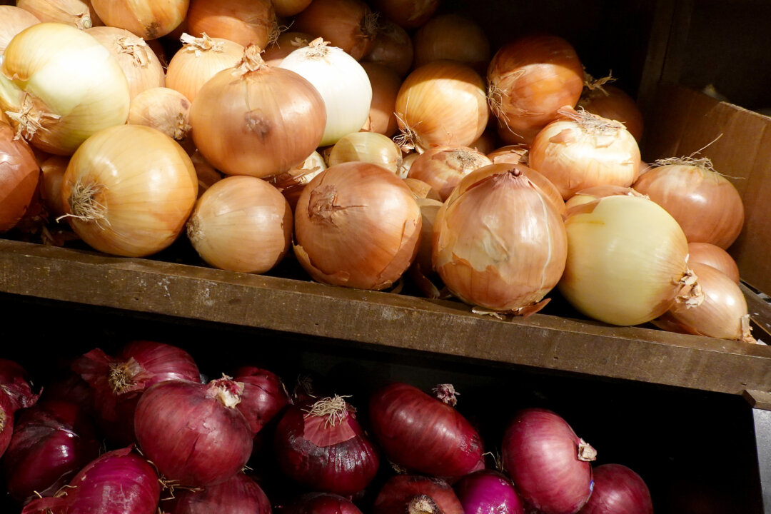 Onions on display in a supermarket in a file photo. (Joe Raedle/Getty Images)