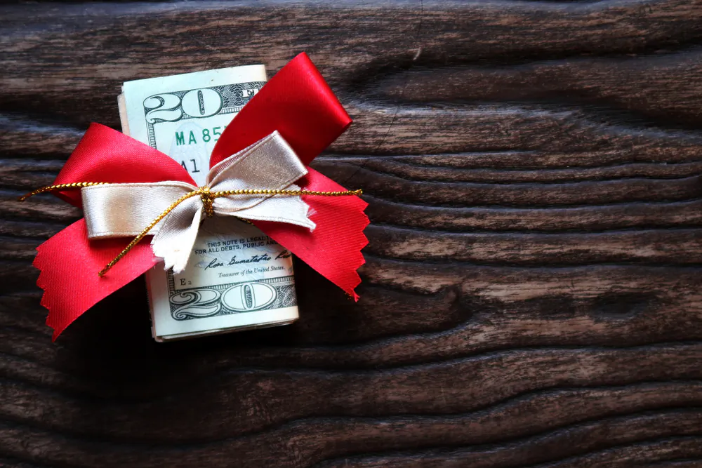 An extra tip during the holiday season is an expression of gratitude for the service provided throughout the year. (Ariya J/Shutterstock)