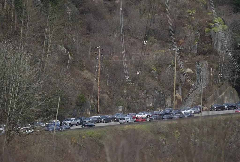 Stranded vehicles are seen where a mudslide happened earlier in the week on Highway 7 west of Agassiz, B.C., November 17, 2021. (The Canadian Press/Jonathan Hayward)