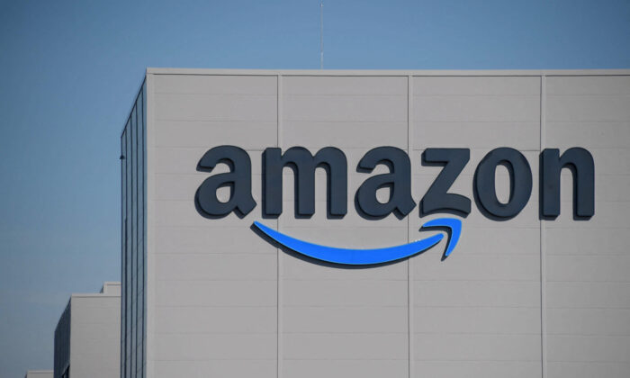 The Amazon logo is pictured on the opening day of a new distribution center in Augny, near Metz, eastern France, on Sept. 23, 2021. (Sebastien Bozon/AFP via Getty Images)