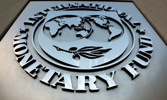 The International Monetary Fund (IMF) logo is seen outside the headquarters building in Washington, on Sept. 4, 2018. (Yuri Gripas/Reuters)