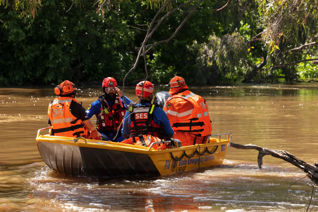 NSW SES flood rescue operators launch a flood boat off the banks of the Lachlan River in Forbes, Australia, on Nov. 17, 2021 . (Brook Mitchell/Getty Images)
