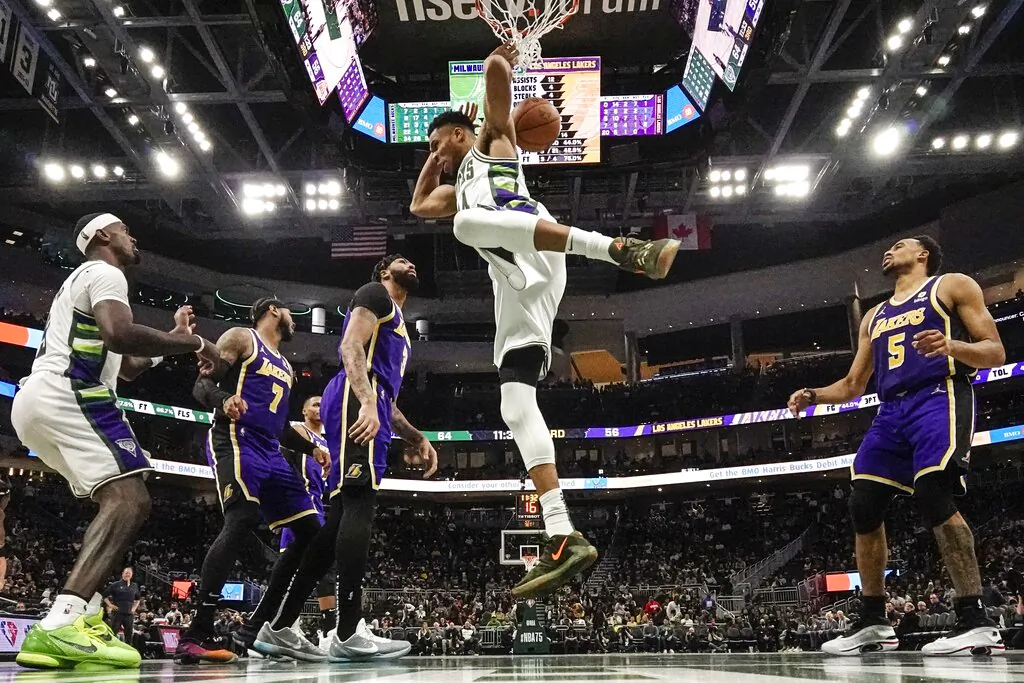 Milwaukee Bucks' Giannis Antetokounmpo dunks during the second half of an NBA basketball game against the Los Angeles Lakers in Milwaukee on Nov. 17, 2021. (Morry Gash/AP Photo)