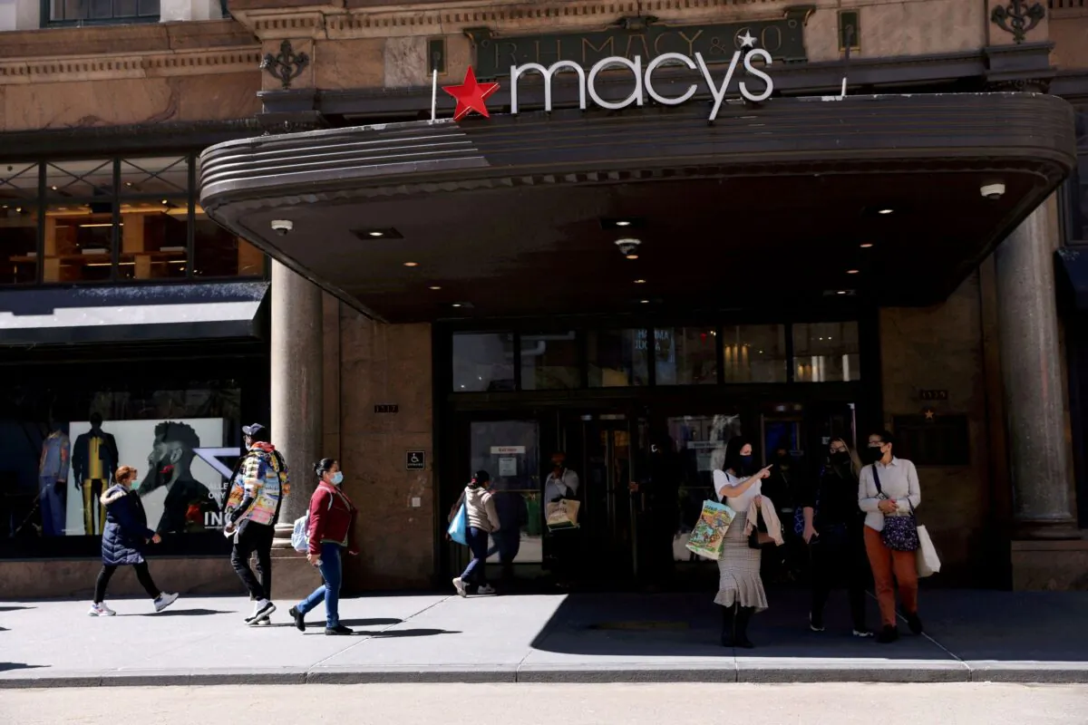 Shoppers are seen outside Macy's in the Manhattan borough of New York City on March 30, 2021. (Caitlin Ochs/Reuters)