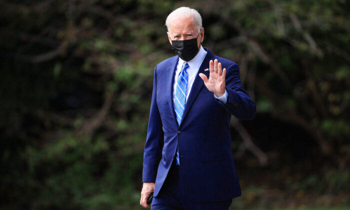 U.S. President Joe Biden walks across the South Lawn as he leaves the White House on Oct. 7, 2021, in Washington, DC. Biden was traveling to the Chicago area to promote his Build Back Better agenda while also encouraging employers have their employees vaccinated. (Chip Somodevilla/Getty Images)