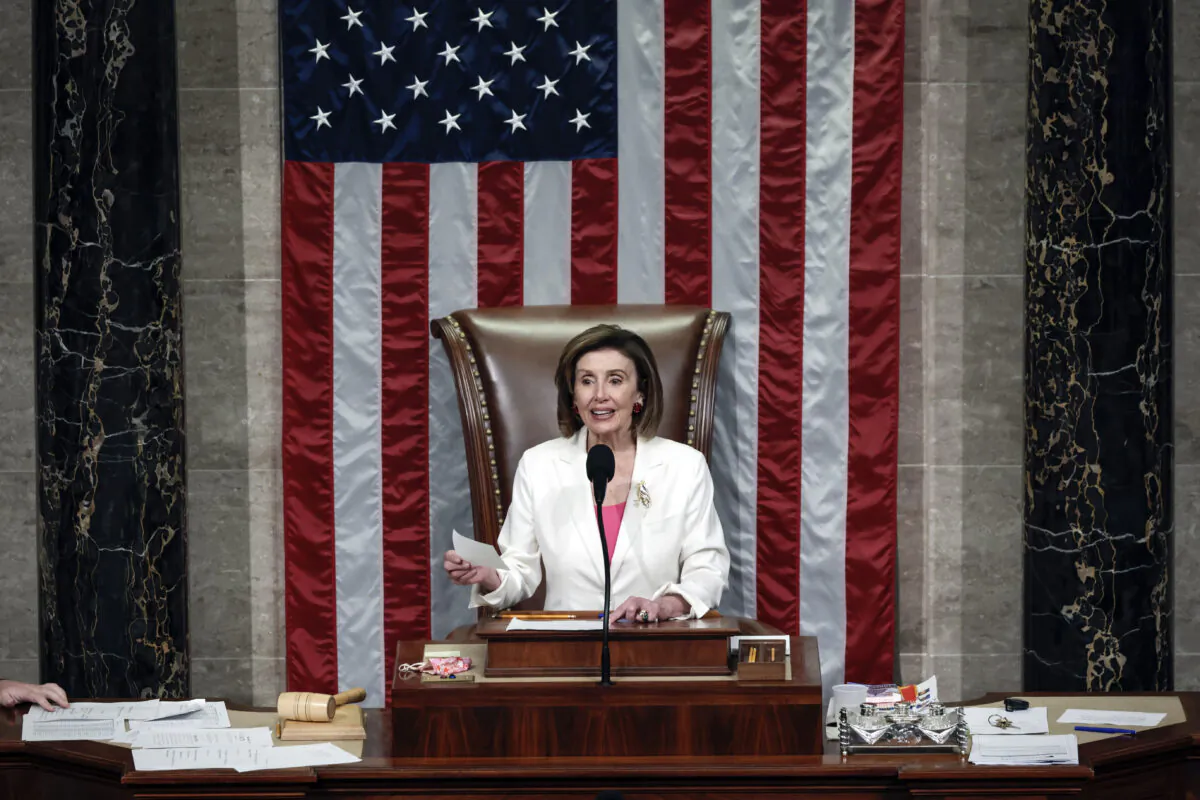 Speaker of the House Nancy Pelosi (D-Calif.) presides over the vote for the Build Back Better Act at the U.S. Capitol in Washington, on Nov. 19, 2021. (Anna Moneymaker/Getty Images)