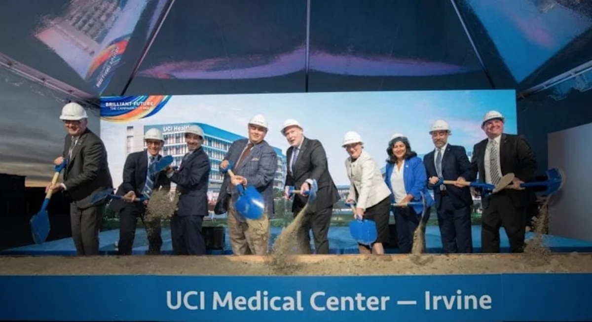 (L to R) James Pratt, associate vice chancellor and campus architect; Dr. Michael Stamos, dean, UCI School of Medicine; Dr. Steve A.N. Goldstein, vice chancellor, health affairs; UC Regent John Pérez, Chancellor Howard Gillman; Dr. Carrie Byington, executive vice president, UC Health; Irvine mayor Farrah N. Khan; Chad Lefteris, CEO, UCI Health; Brian Hervey, vice chancellor, university advancement. (Courtesy of Steve Zylius)