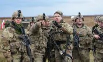 UK to Send More Troops to Help Poland Tackle Belarus Migrant Crisis: Report