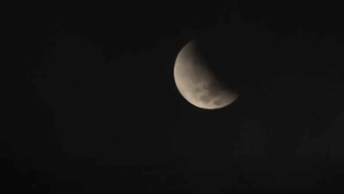 A moon eclipse early in the morning, in Mexico City, Mexico, on Nov. 19, 2021, in a still from video. (AP/Screenshot via The Epoch Times)