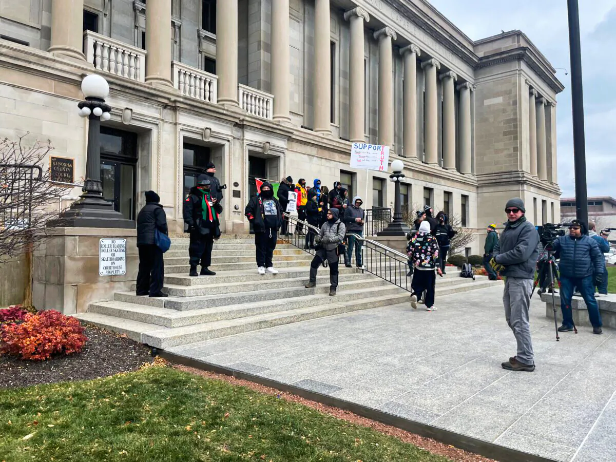 People gather outside the Kenosha County Courthouse in Kenosha, Wis., on Nov. 18, 2021. (Jackson Elliott/The Epoch Times)