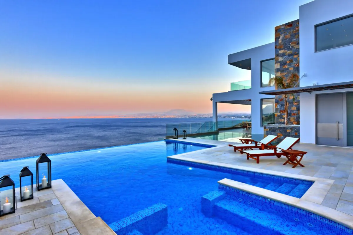 The villa’s interiors open onto exterior terraces and a stunning infinity pool area facing Heraklion Bay and the azure Cretan Sea below. (Pantelis Mathioudakis)