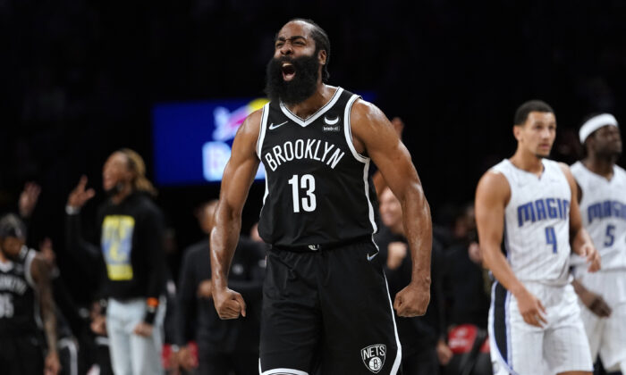 Brooklyn Nets guard James Harden reacts during the second half of an NBA basketball game against the Orlando Magic, in New York, on Nov. 19, 2021. (Mary Altaffer/AP Photo)