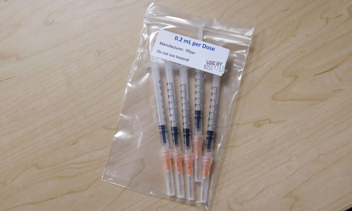 Syringes with the Pfizer COVID-19 vaccine to be administered to children from 5-11 years old are seen at the Beaumont Health offices in Southfield, Mich., on Nov. 5, 2021. (Jeff Kowalsky/AFP via Getty Images)