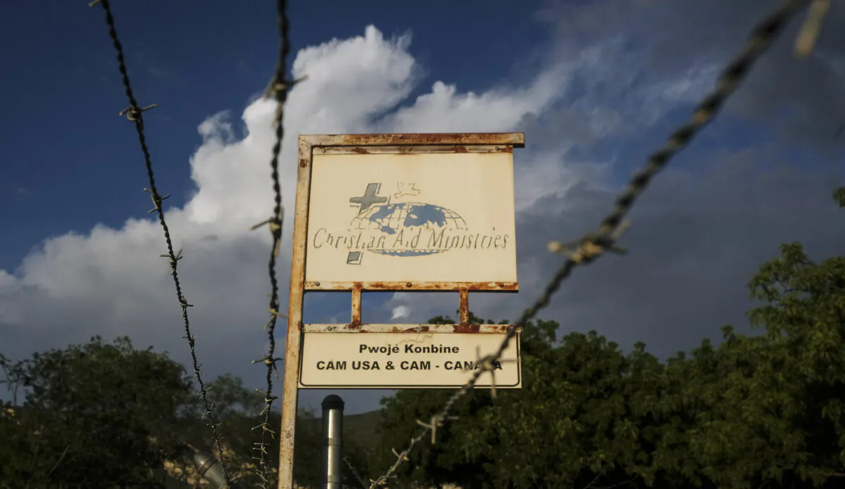 A sign outside Christian Aid Ministries in Titanyen, Haiti, on Oct. 21, 2021. (Matias Delacroix/AP Photo)