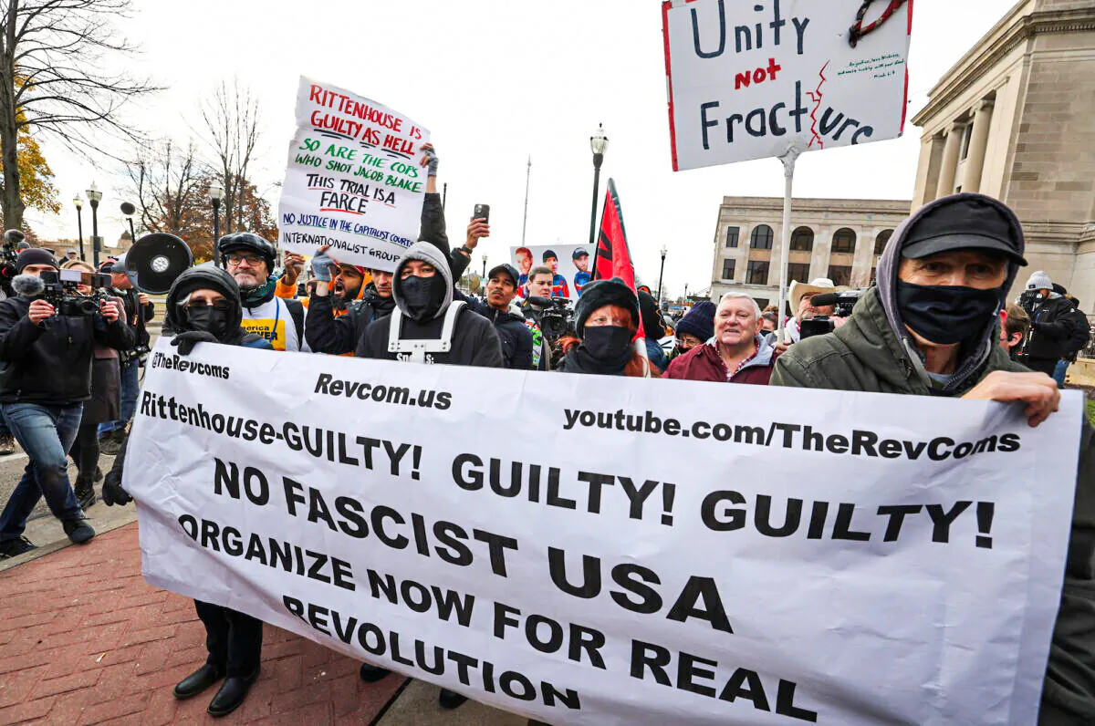 People react to the verdict in the trial of Kyle Rittenhouse, outside the Kenosha County Courthouse in Kenosha, Wis., on Nov. 19, 2021. (REUTERS/Evelyn Hockstein)