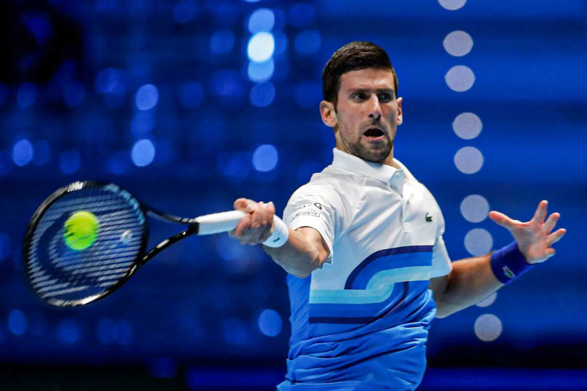 Serbia's Novak Djokovic in action during his group stage match against Britain's Cameron Norrie at the Pala Alpitour in Turin, Italy, on Nov. 19, 2021. (Guglielmo Mangiapane/Reuters)