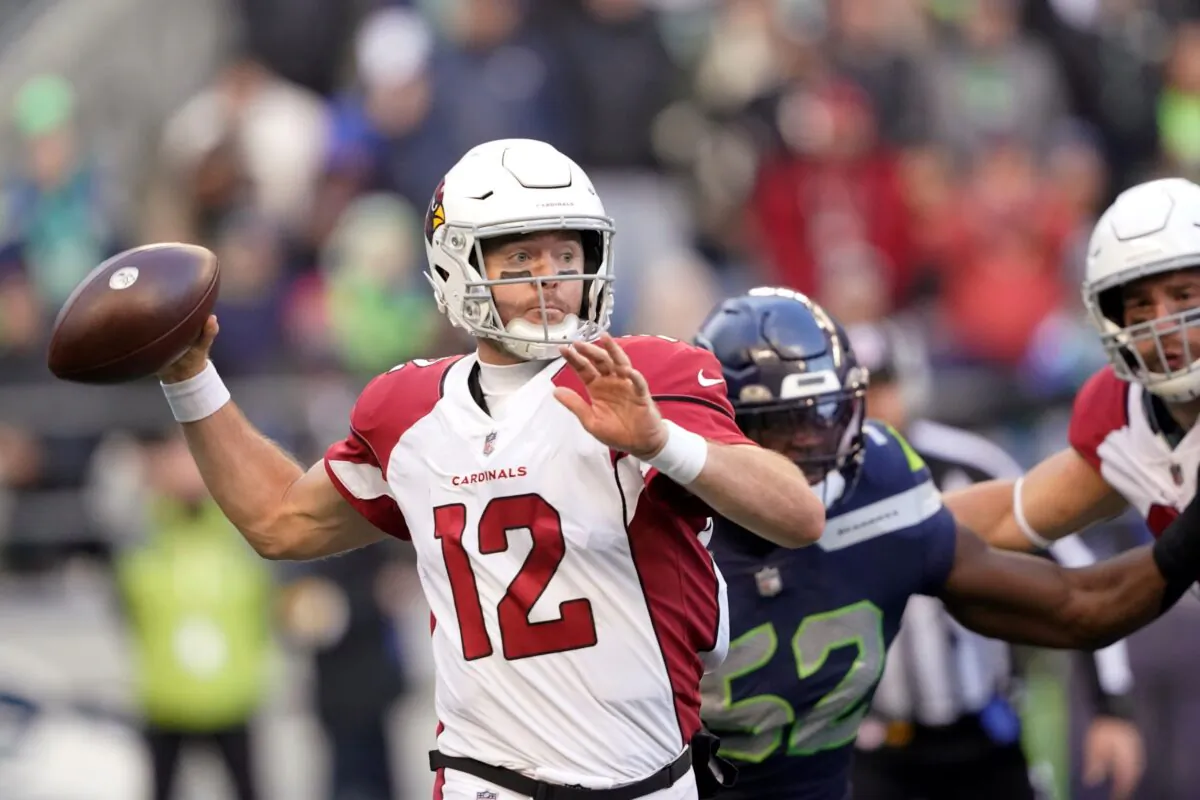 Arizona Cardinals Colt McCoy throws against the Seattle Seahawks during the second half of an NFL football game in Seattle, on Nov. 21, 2021. (Ted S. Warren/AP Photo)