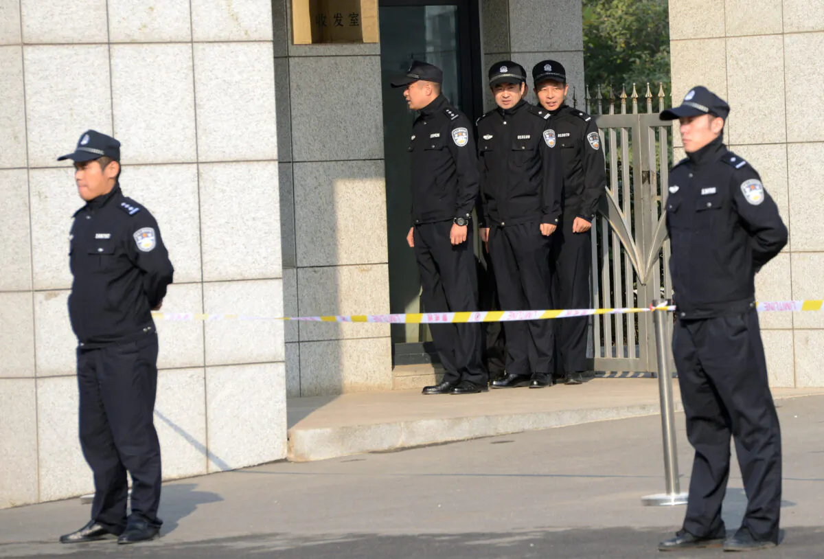 File photo of Chinese police. (Goh Chai Hin/AFP via Getty Images)