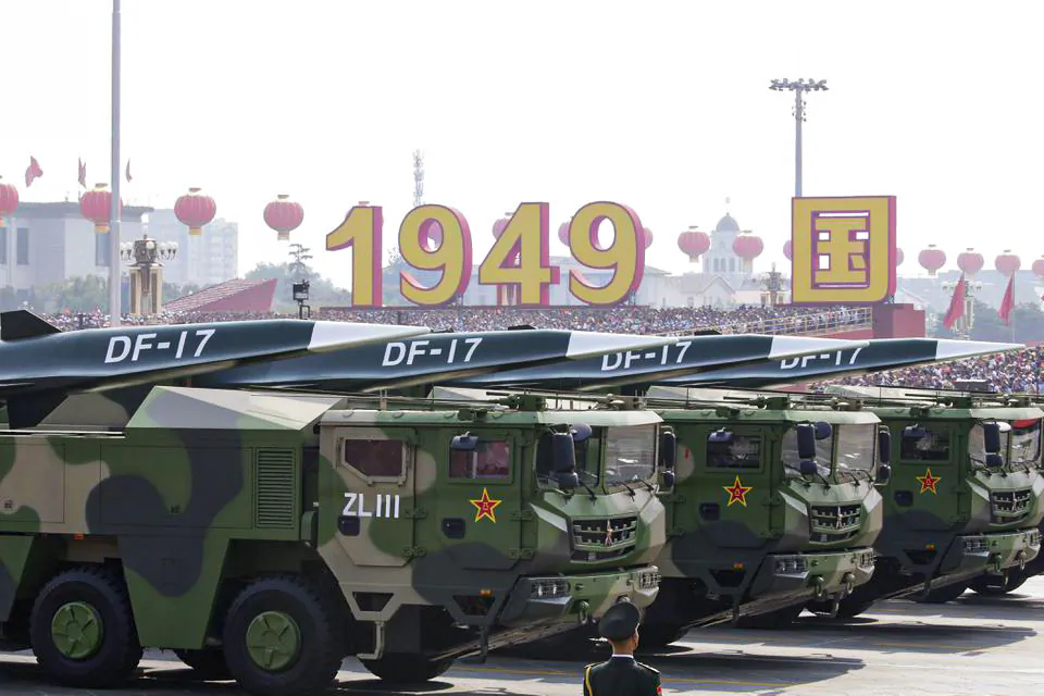 Military vehicles carrying hypersonic DF-17 missiles travel past Tiananmen Square during a military parade in Beijing on Oct. 1, 2019. (Jason Lee/Reuters)