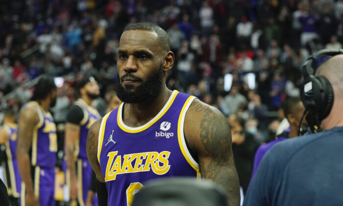 Los Angeles Lakers forward LeBron James is ejected after fouling Detroit Pistons center Isaiah Stewart during the second half of an NBA basketball game in Detroit on Nov. 21, 2021. (Carlos Osorio/AP Photo)