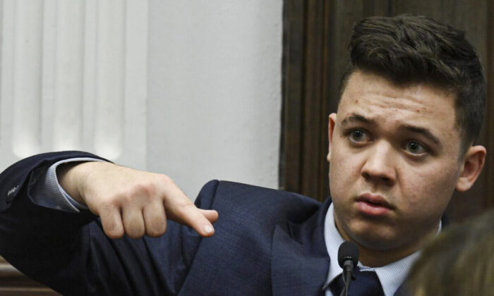 Kyle Rittenhouse testifies about Gaige Grosskreutz holding a gun toward him during cross examination in his trial at the Kenosha County Courthouse in Kenosha, Wis., on Nov. 10, 2021. (Mark Hertzberg /Pool Photo via AP)