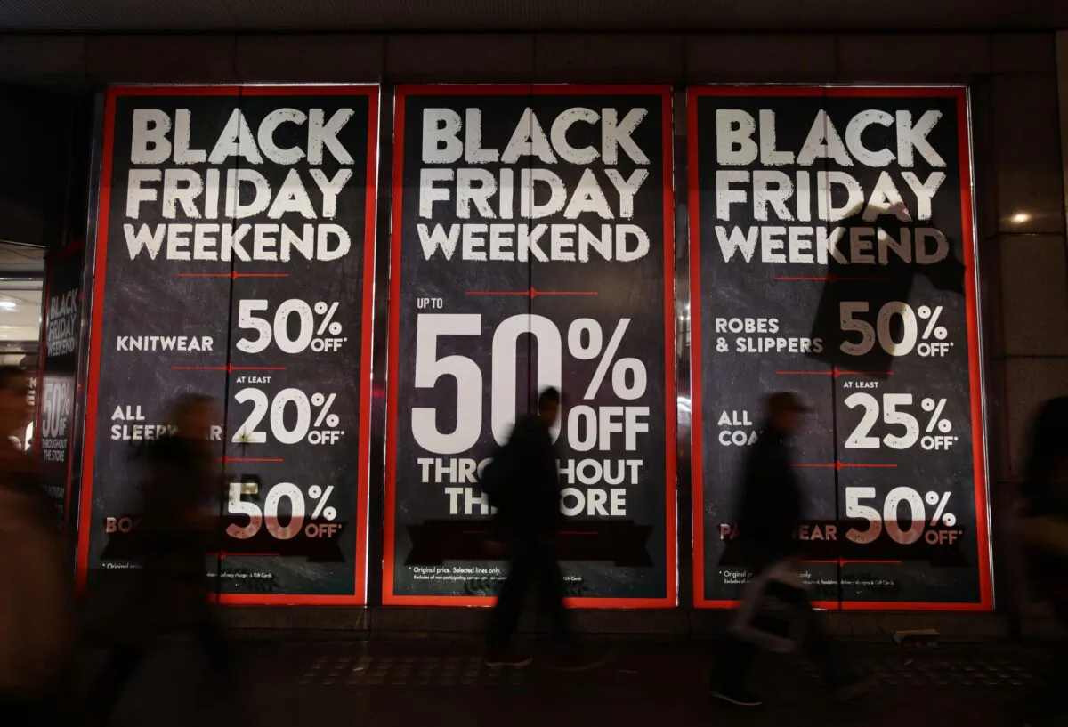 Black Friday sales signs are displayed in high street in England, in the week ahead of the Nov. 26, 2021.(Yui Mok/PA)