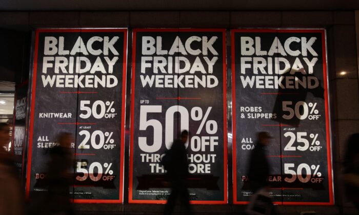 Black Friday sales signs are displayed in high street in England, in the week ahead of the Nov. 26, 2021.(Yui Mok/PA)