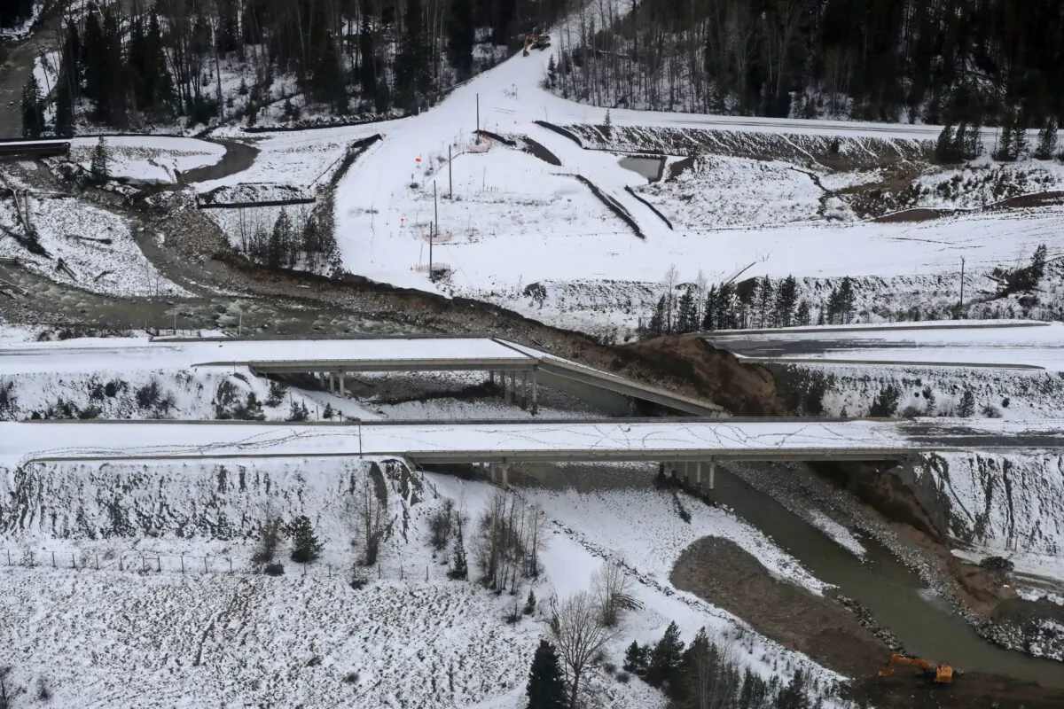 Damage caused by heavy rains and mudslides is shown in this aerial photo along the Coquihalla Highway south of Merritt, B.C., on Nov. 22, 2021. (The Canadian Press/Darryl Dyck) 