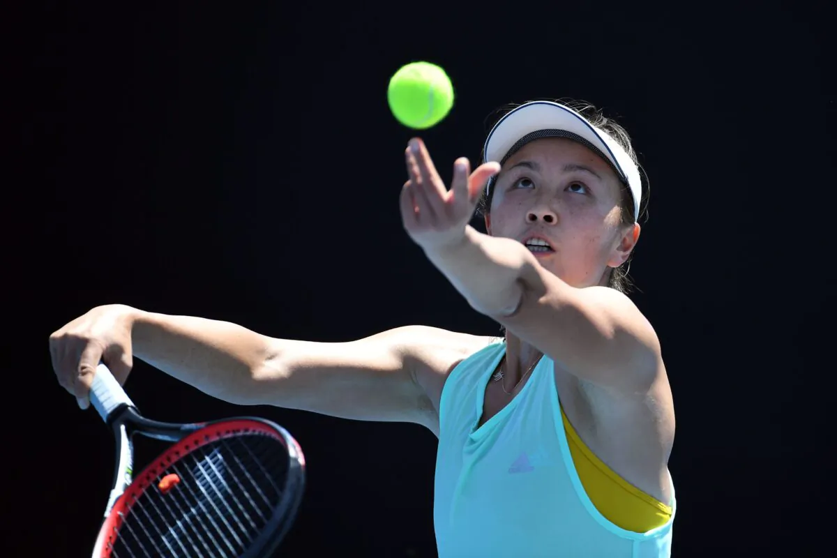 China's Peng Shuai serves the ball during a practice session ahead of the Australian Open tennis tournament in Melbourne on Jan. 13, 2019. (William West/AFP via Getty Images)