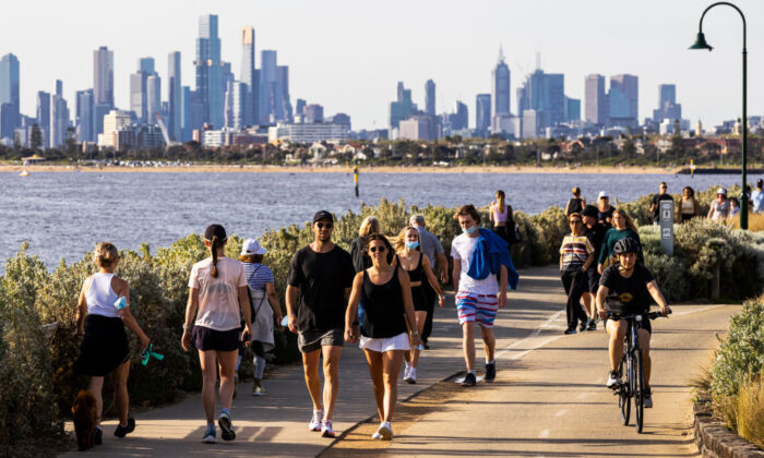 People are seen exercising in Brighton in Melbourne, Australia, on Oct. 20, 2021. (Daniel Pockett/Getty Images)