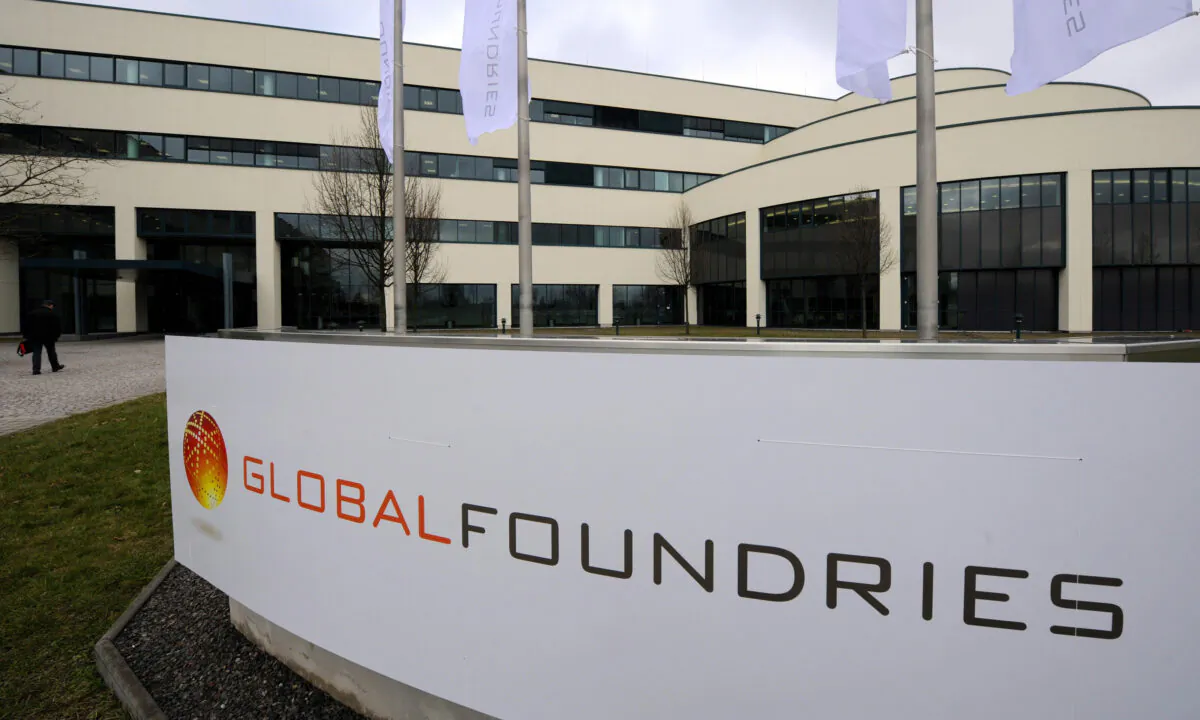 The logo of U.S. chipmaker Globalfoundries can be seen at the company's plant in Dresden, eastern Germany, on March 4, 2009. (Norbert Millauer/DDP/AFP via Getty Images)