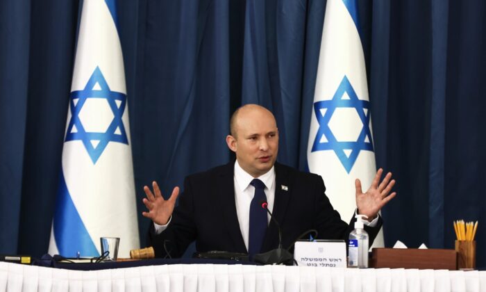 Israeli Prime Minister Naftali Bennett speaks at the weekly cabinet meeting at the Foreign Ministry in Jerusalem, Israel, on  Aug. 8, 2021. (Ronen Zvulun/Pool via AP)