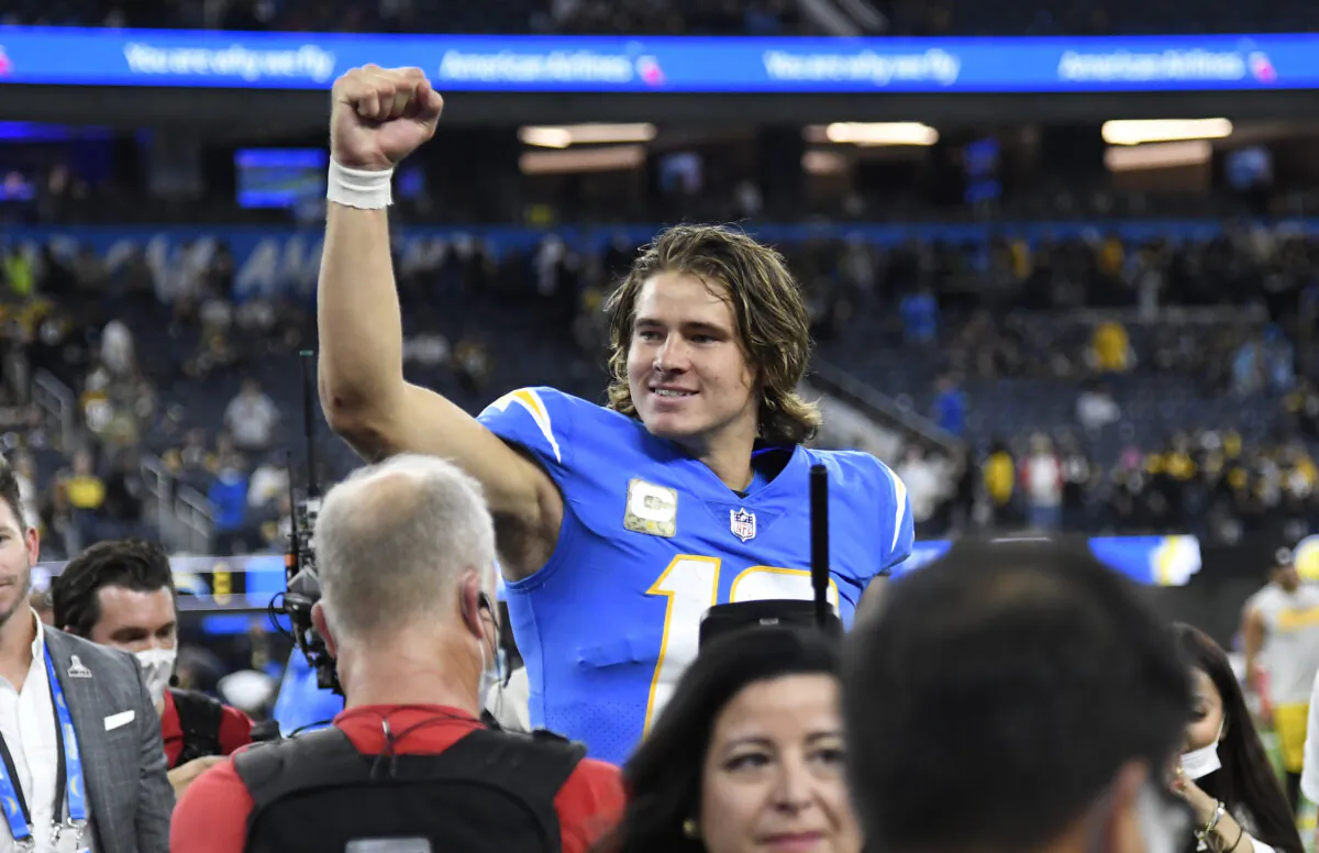 Justin Herbert #10 of the Los Angeles Chargers reacts after a win against the Pittsburgh Steelers at SoFi Stadium in Inglewood, Calif., on Nov. 21, 2021. (Kevork Djansezian/Getty Images)
