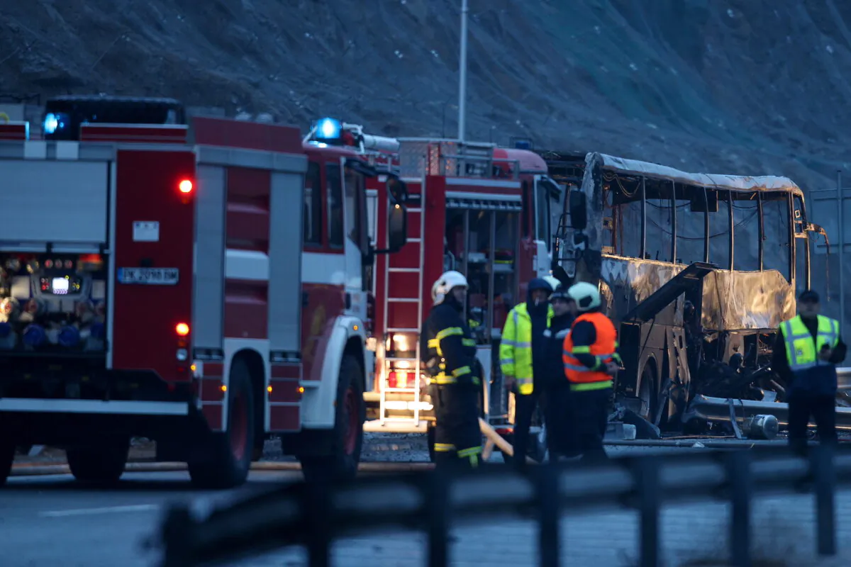 A view shows the site where a bus with North Macedonian plates caught fire on a highway, near the village of Bosnek, Bulgaria, on Nov. 23, 2021. (Stoyan Nenov/Reuters)