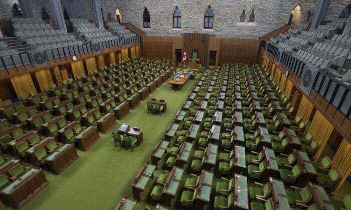  House of Commons chamber is seen empty in Ottawa on April 8, 2020 . ( Canadian Press/Adrian Wyld) 
