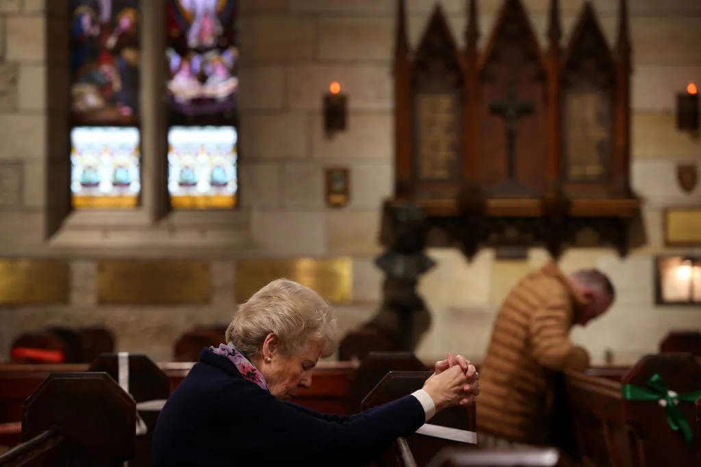 Parishioners pray during the ‘Twenty-First Sunday after Pentecost’ service with Father James Collins at St Paul’s Anglican Church in Sydney, Australia, on Oct. 25, 2020. (Lisa Maree Williams/Getty Images)