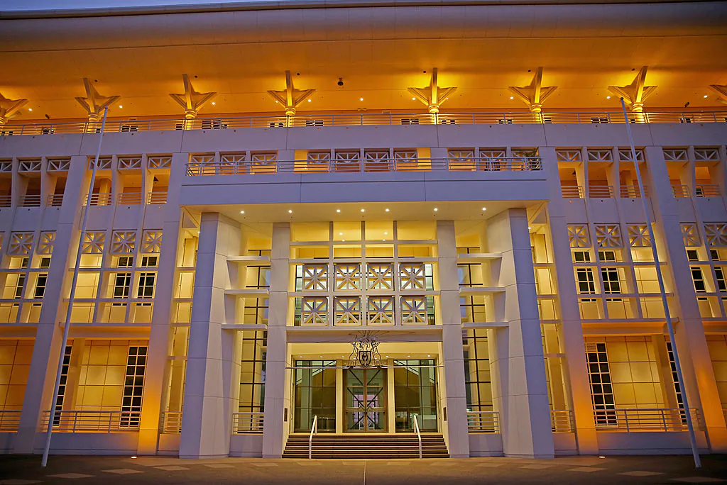 Parliament House is lit up at dusk in State Square on October 6, 2013 in Darwin, Australia. (Photo by Scott Barbour/Getty Images)