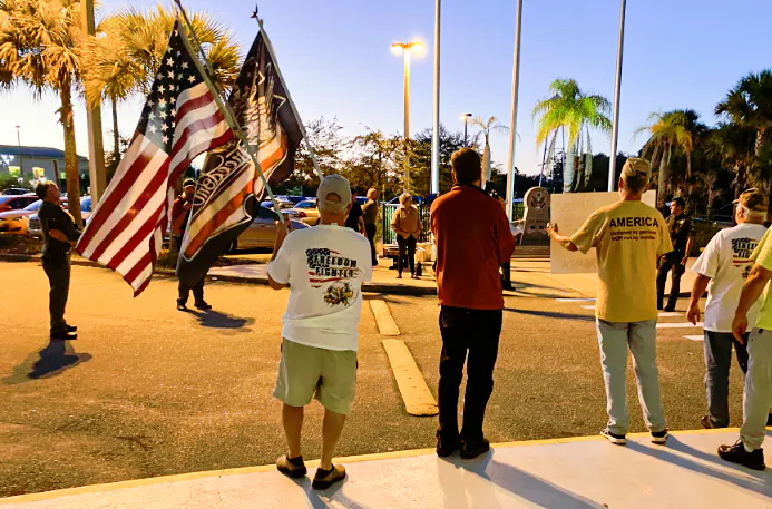 Protesters gather outside the county building during a Flagler County School Board Meeting on Nov. 16, 2021. (Patricia Tolson/The Epoch Times)