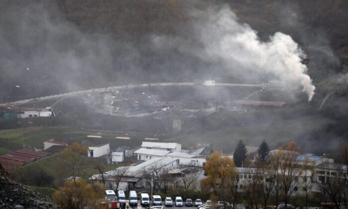 Smoke rises from a factory area after blasts occurred, near Belgrade, Serbia, on Nov. 23, 2021. (AP Photo)