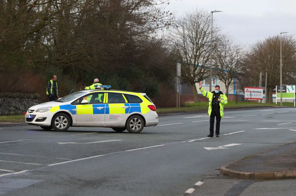 Police outside the Wockhardt vaccine plant in Wrexham, England following a bomb scare on Jan. 27, 2021. (Peter Byrne/PA)