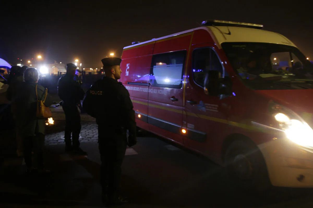 French police officers patrol on the beach in the searcher migrants in Wimereux, northern France on Nov.17, 2021. (Louis Witter/AP Photo)