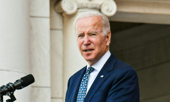 President Joe Biden speaks during an event to commemorate Veterans Day in the Memorial Amphitheater, at Arlington National Cemetery in Arlington, Va., on Nov. 11, 2021. (Nicholas Kamm/AFP via Getty Images)