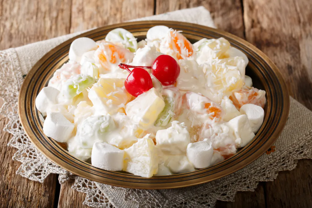 Modern ambrosia, a sort of dessert that teeters toward fruit salad, leans on packaged and canned foods—but it wasn't always so. (AS Food studio/Shutterstock)
