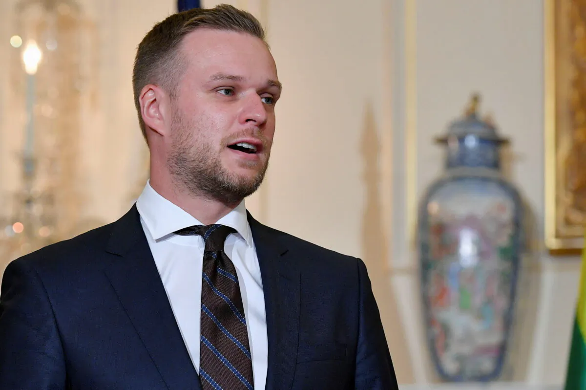 Lithuania's Foreign Minister Gabrielius Landsbergis speaks with U.S. Secretary of State Antony Blinken (not pictured) in the Benjamin Franklin Room of the State Department ahead of a meeting, in Washington, on Sept. 15, 2021. (Mandel Ngan/via Reuters)