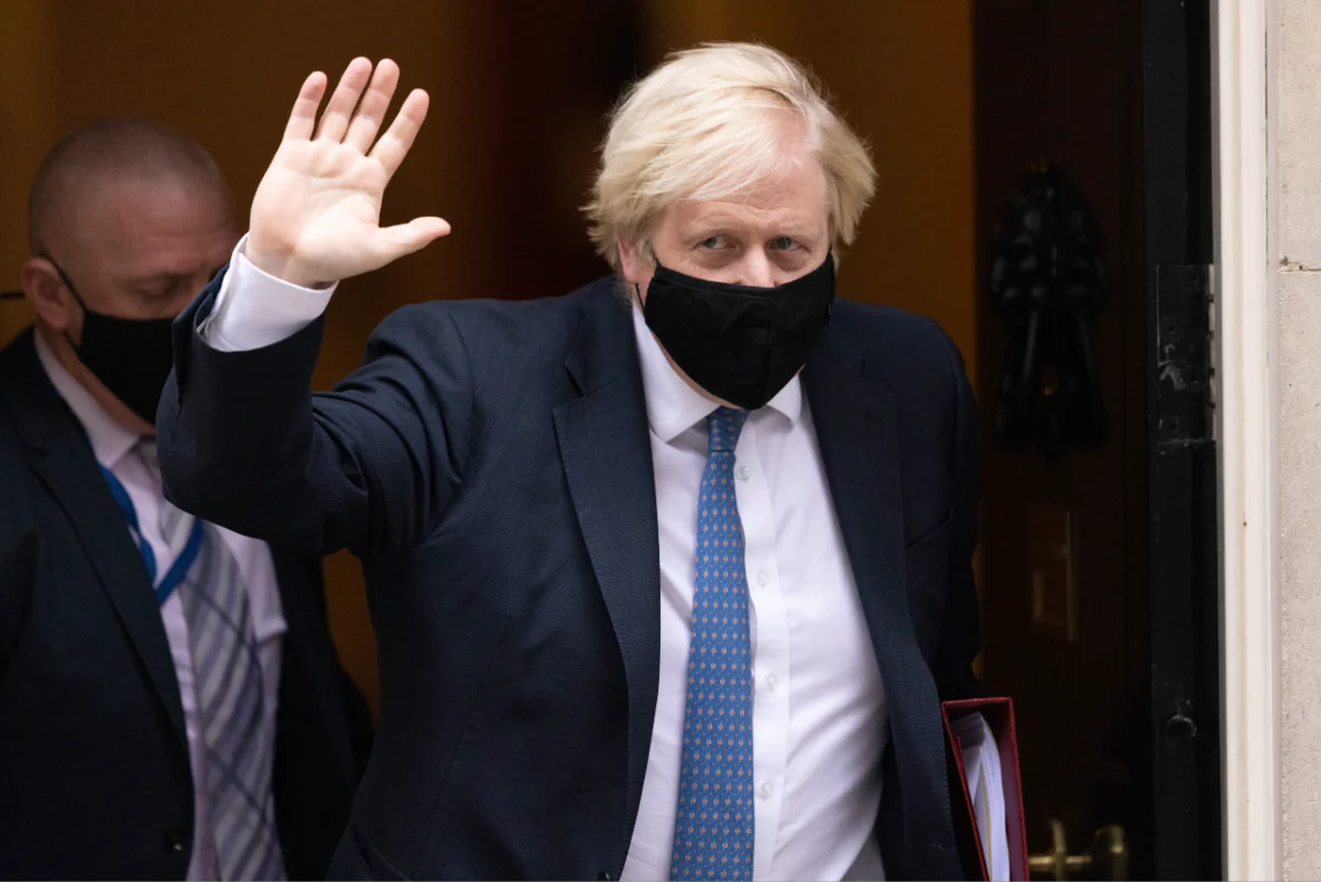 Prime Minister Boris Johnson leaves Downing Street to attend the weekly Prime Ministers Questions in Parliament in London on Nov. 24, 2021. (Dan Kitwood/Getty Images)