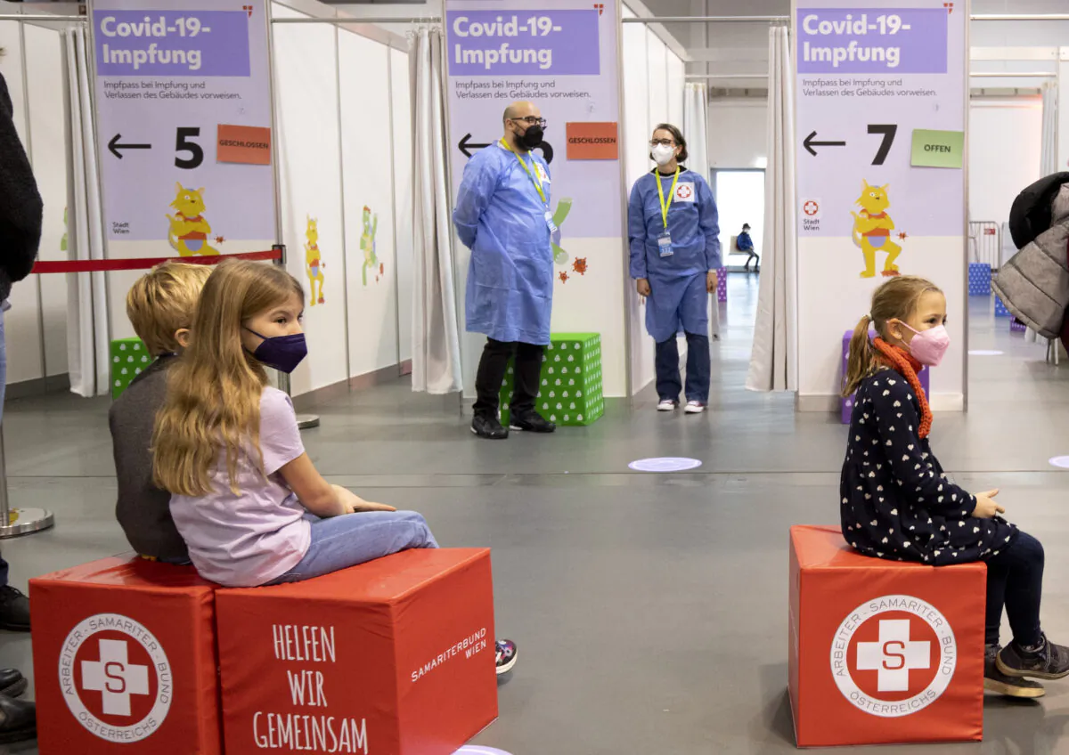 Children wait in line to receive their first shot of the COVID-19 vaccine in Vienna, Austria, on Nov. 15, 2021. (Joe Klamar/AFP via Getty Images)