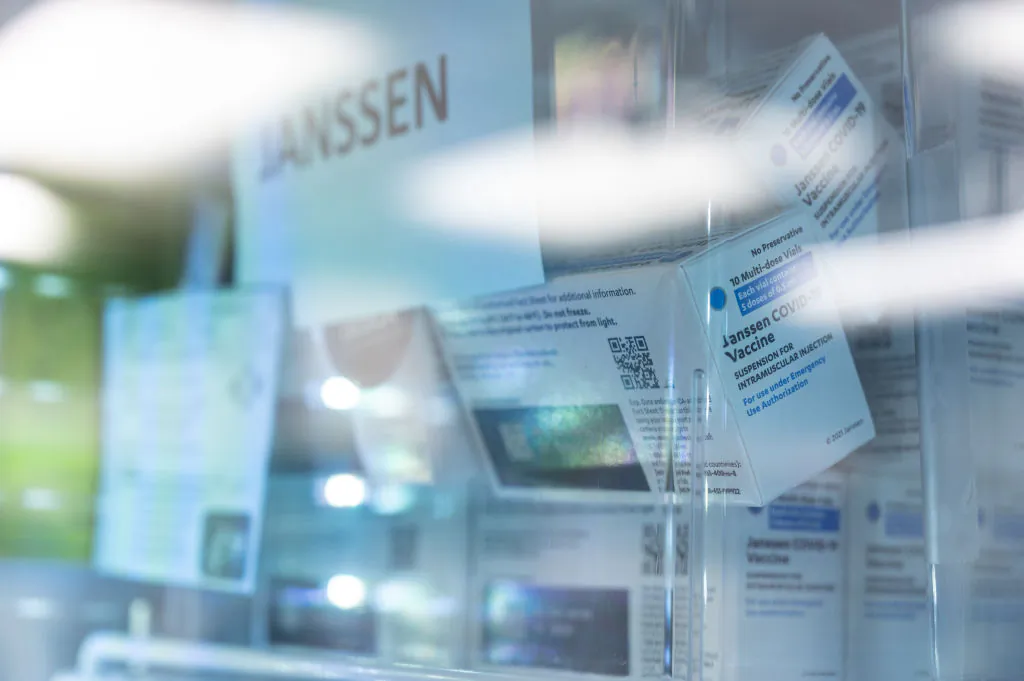 Boxes containing Janssen COVID-19 vials sit stacked in a refrigeration unit shortly after their delivery to Louisville Metro Health and Wellness headquarters in Louisville, Ky., on March 4, 2021. (Jon Cherry/Getty Images)
