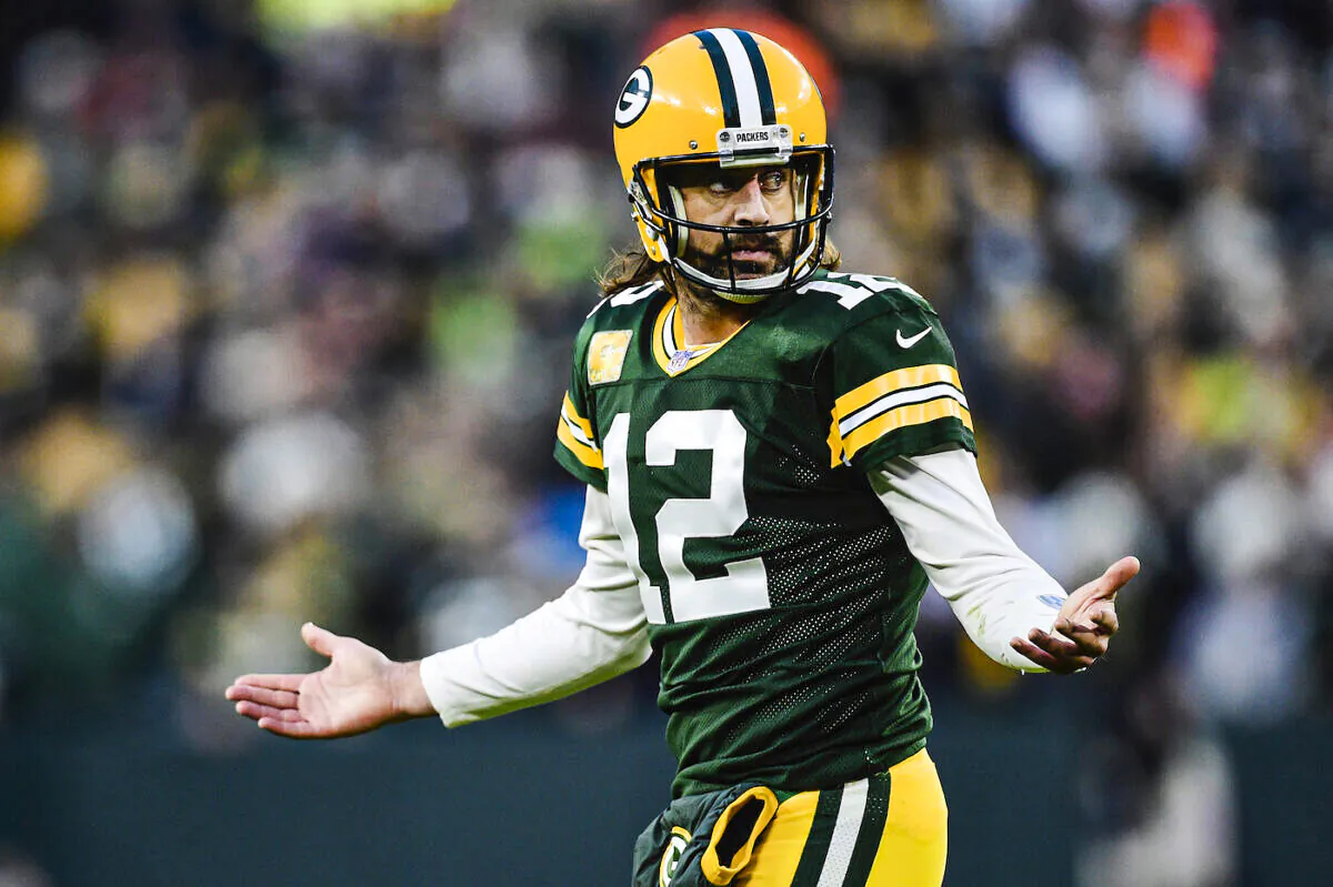 Aaron Rodgers #12 of the Green Bay Packers reacts after throwing an incomplete pass on third down during the first half against the Seattle Seahawks at Lambeau Field, Green Bay, Wisconsin on Nov.14, 2021. (Patrick McDermott/Getty Images)