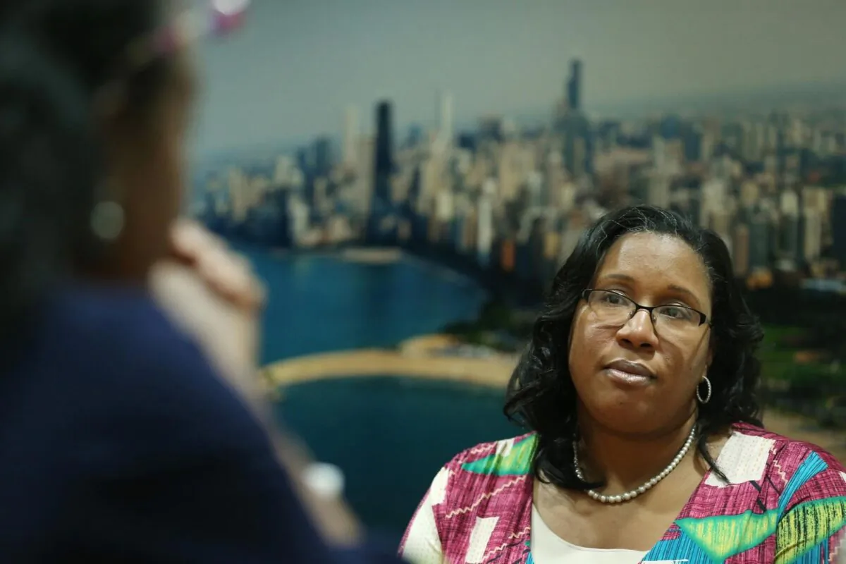 Chicago Treasurer Melissa Conyears-Ervin listens as her press secretary, Yolanda Joe, speaks during an interview at Conyears-Ervin’s office in City Hall in Chicago, on Nov. 21, 2019.    (John J. Kim/Chicago Tribune/TNS)
