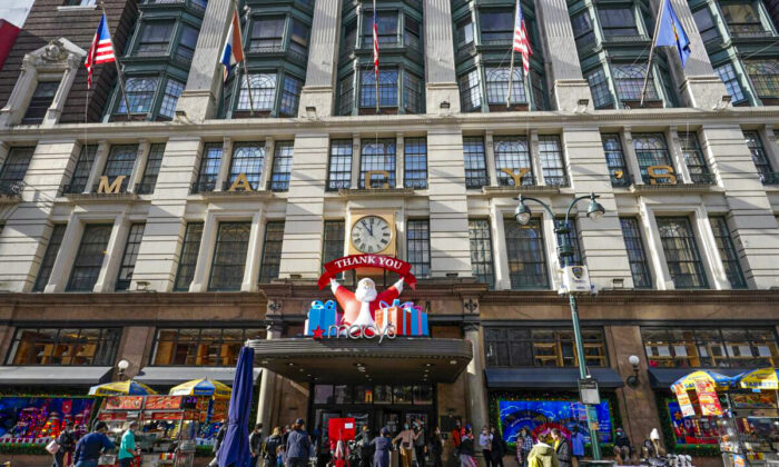 Black Friday shoppers walk past Macy's flagship store in New York's Herald Square, on Nov. 27, 2020.  (Mary Altaffer/AP Photo)